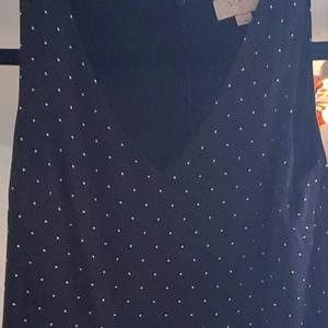 Knee length petite black polka dotted dress
